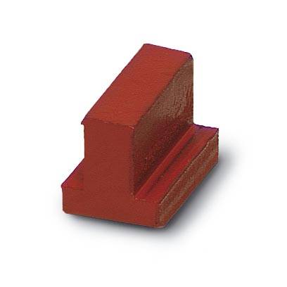Roter Block aus Metall in Form eines Winkels, auf einer weißen Hintergrundfläche, zeigt eine robuste Bauweise und glatte Oberflächen.