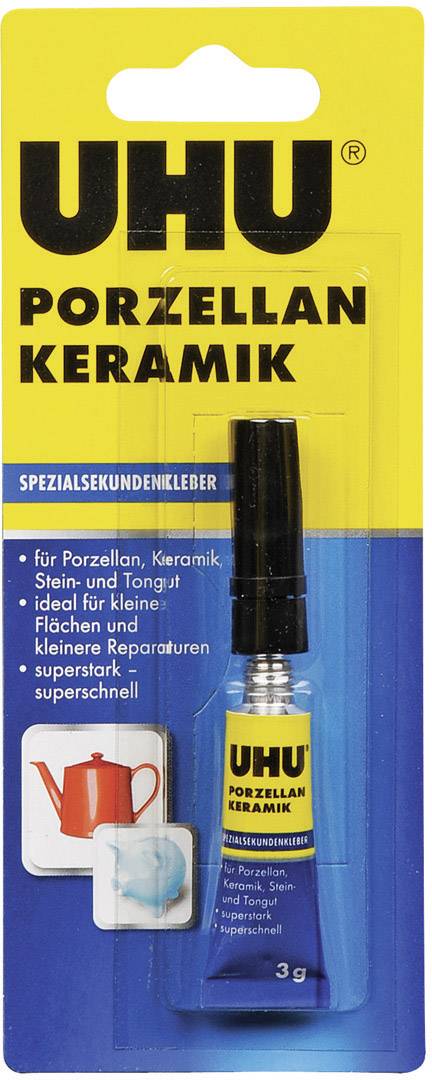 Klebstoffverpackung mit der Aufschrift 'UHU Porzellan Keramik'. Eignet sich für Porzellan- und Keramikreparaturen. Verpackung zeigt eine Teekanne.