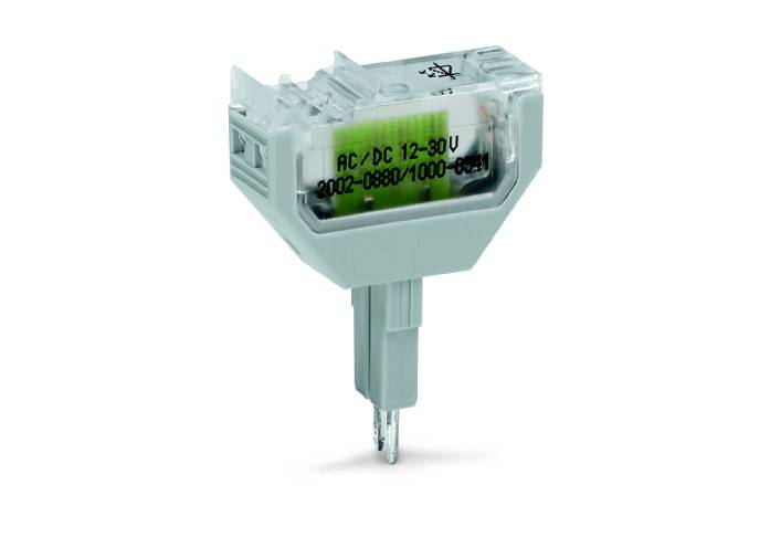 Eine transparente, kleine elektronische Komponente mit der Aufschrift 'AC/DC 12-30 V', geeignet für elektrische Anwendungen.