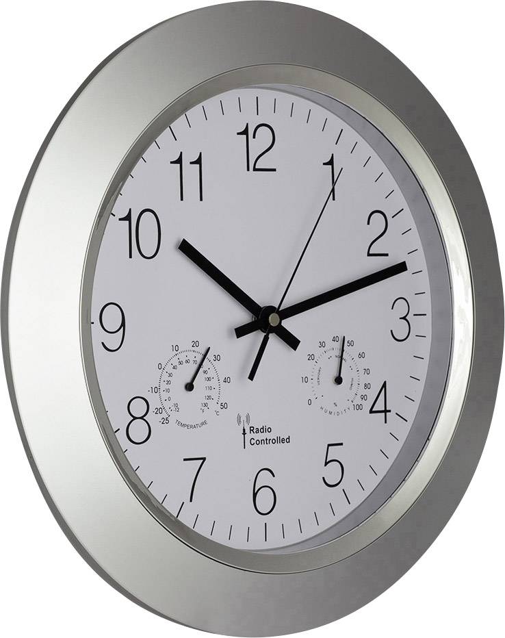 Eine analoge Wanduhr mit silbernem Rahmen zeigt 10:09 Uhr. Unter dem Zifferblatt sind zwei kleine Anzeigen für Temperatur und Luftfeuchtigkeit.