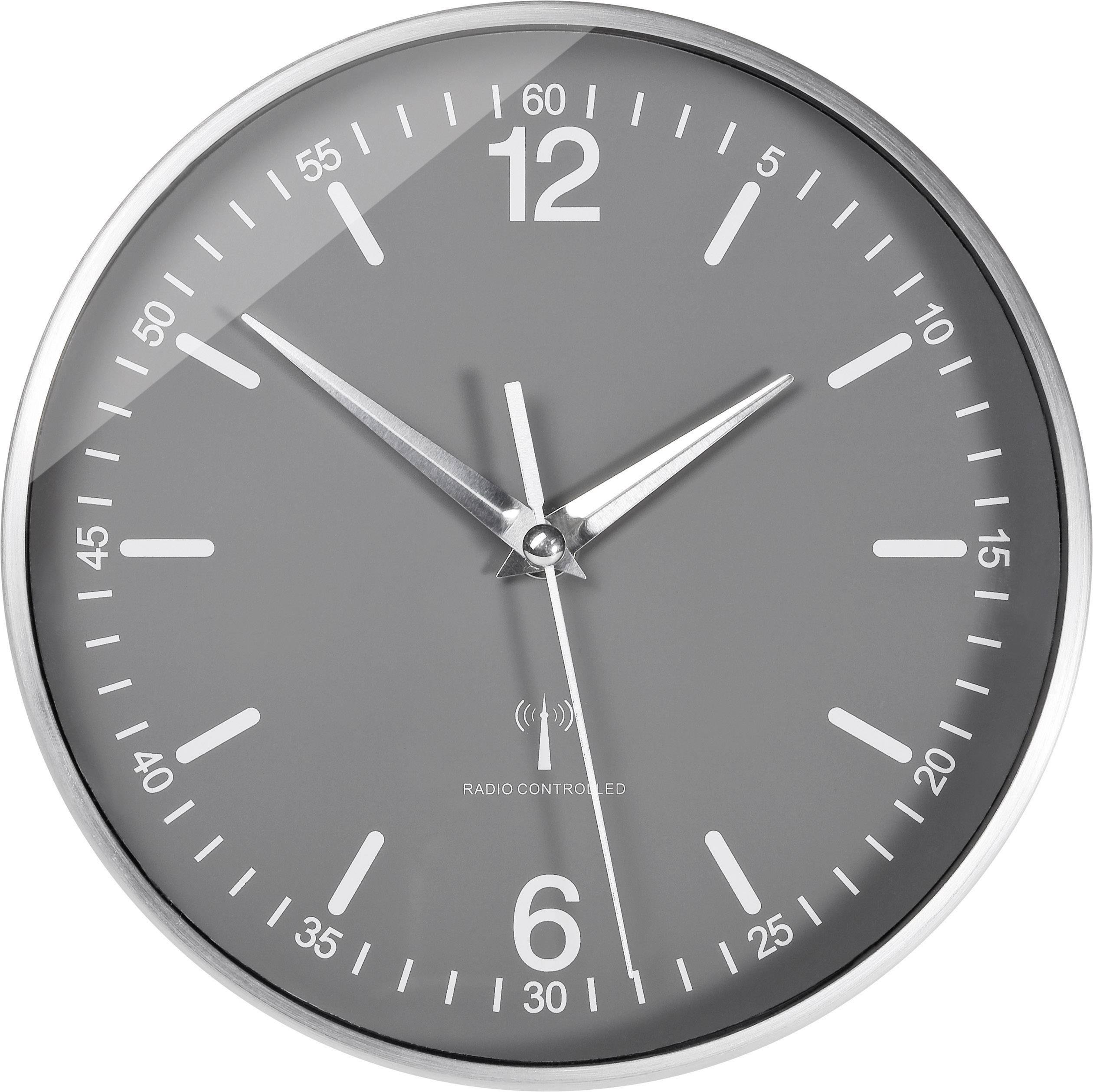 Eine graue analoge Wanduhr mit silbernem Rand zeigt die Uhrzeit 12:02.