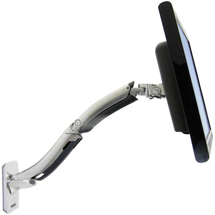 Ein verstellbarer Monitorarm, der an einer Wand montiert ist, hält einen Bildschirm. Der Arm hat Gelenke, die Flexibilität bieten.