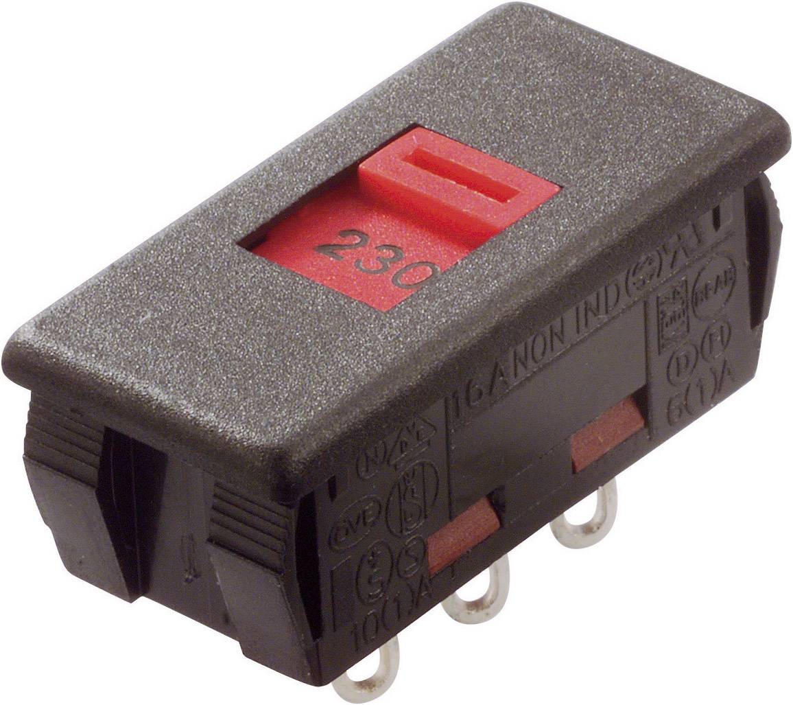 Ein rechteckiger elektrischer Schalter mit einem roten Schalter und der Zahl '230'. Der Schalter hat mehrere Metallkontakte unten.