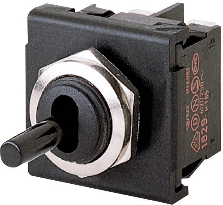 Ein quadratischer schwarzer Kippschalter mit einem silbernen Rahmen und einem schwarzen Hebel, der zur Steuerung elektronischer Geräte dient.