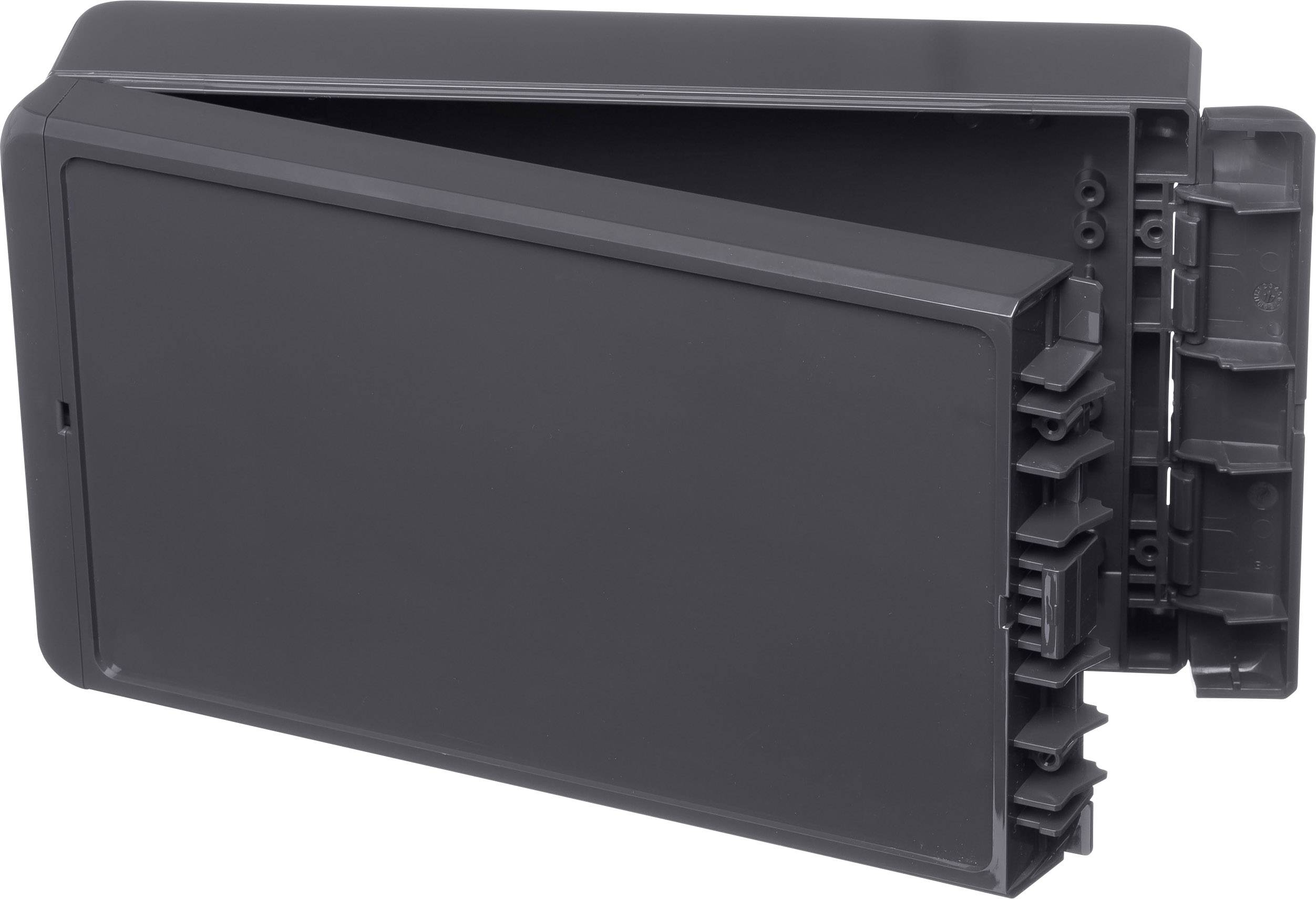 Ein offener, schwarzer Plastikbehälter, möglicherweise für Batterien oder Elektronikkomponenten, mit mehreren Fächern.