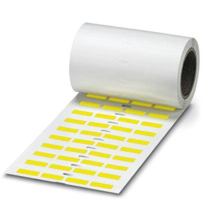 Eine Rolle mit gelben rechteckigen Etiketten auf weißem Trägerpapier ist zu sehen. Die Etiketten sind in gleichmäßigen Reihen angeordnet.