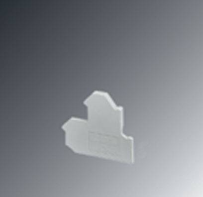 Unscharfes Bild eines kleinen, transparenten Kunststoffobjekts mit ungewöhnlicher Form auf grauem Hintergrund.