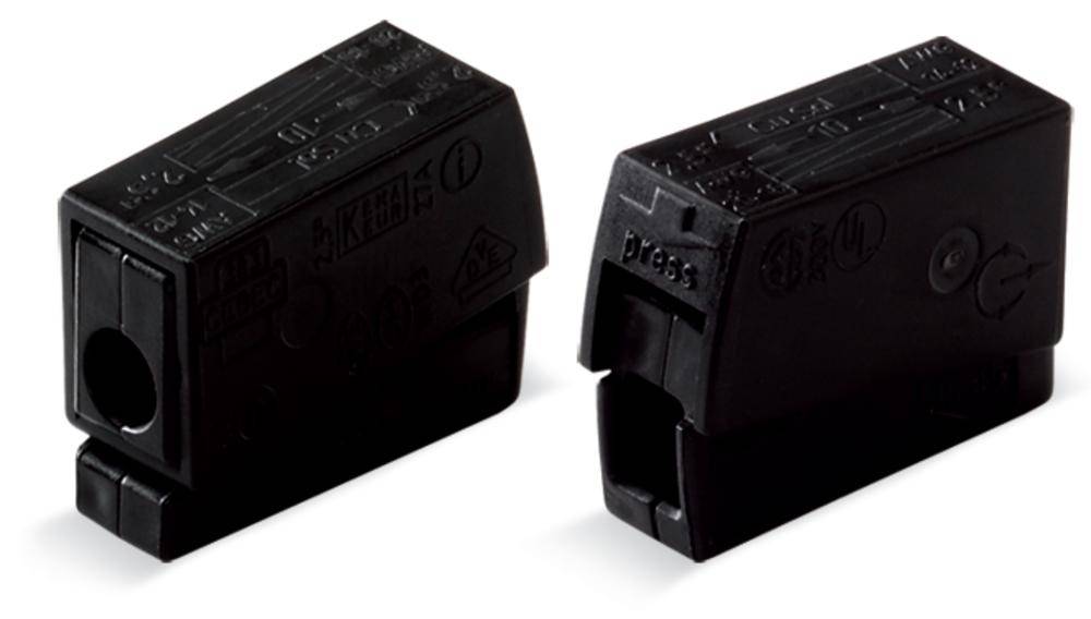 Zwei schwarze elektrische Sicherungen mit Beschriftungen stehen nebeneinander vor weißem Hintergrund. Sie wirken klein und kompakt.