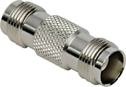 Ein silberner Koaxialadapter mit gerändelter Oberfläche, der zwei Koaxialkabel verbindet.