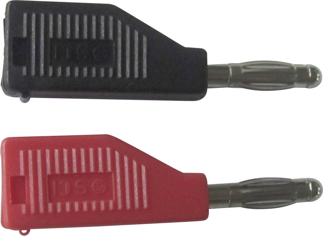 Zwei Bananenstecker, einer schwarz, der andere rot, für elektrische Verbindungen.