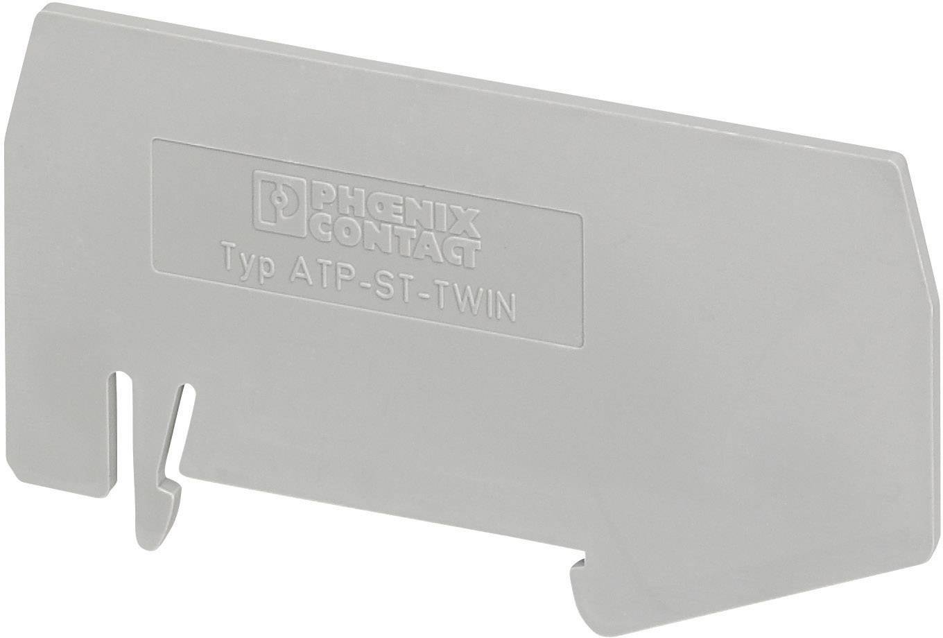Graues Bauteil mit der Aufschrift 'Phoenix Contact, Typ ATP-ST-TWIN', verwendet als Trennplatte in elektrischen Schaltschränken.
