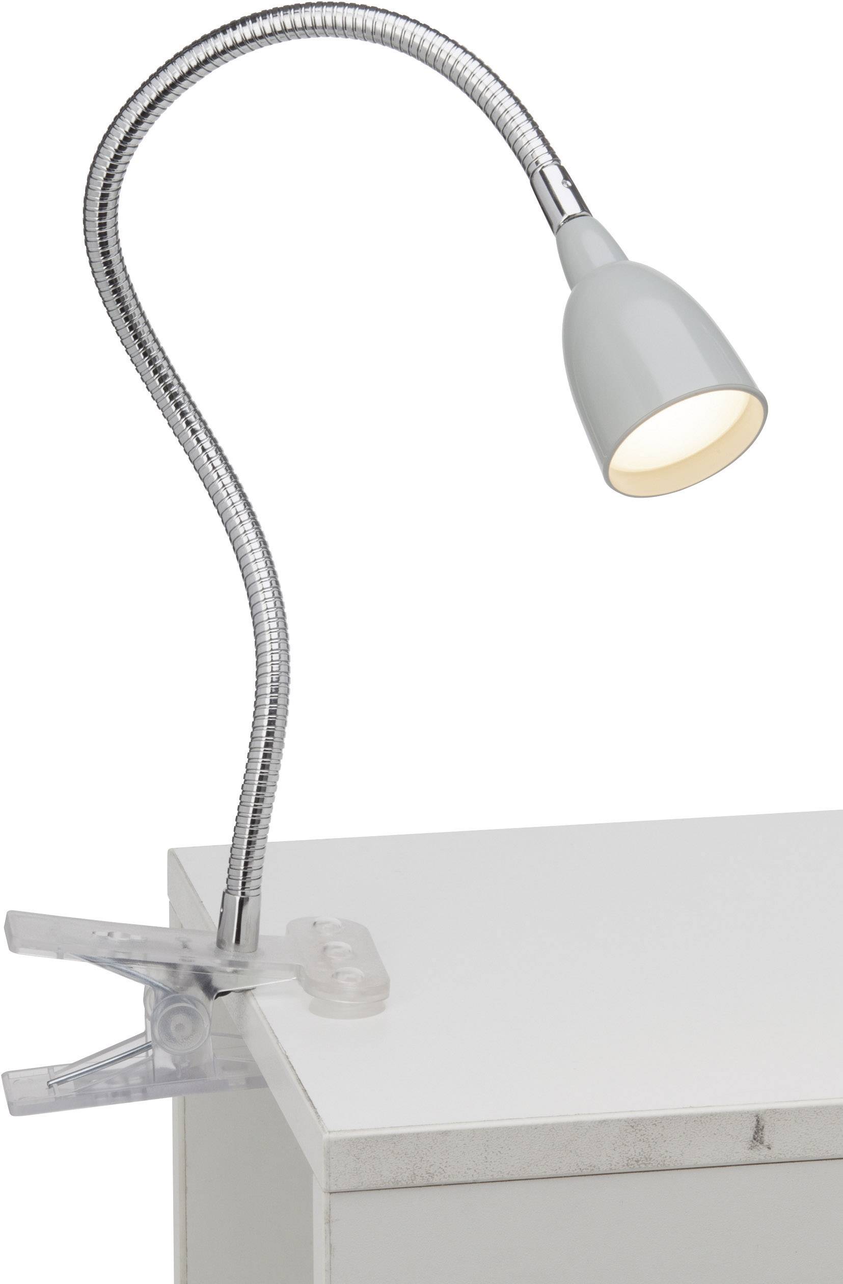 Flexible Schreibtischlampe mit Klemme, die an der Tischkante befestigt ist. Lampe hat einen biegsamen Arm und strahlt helles Licht aus.