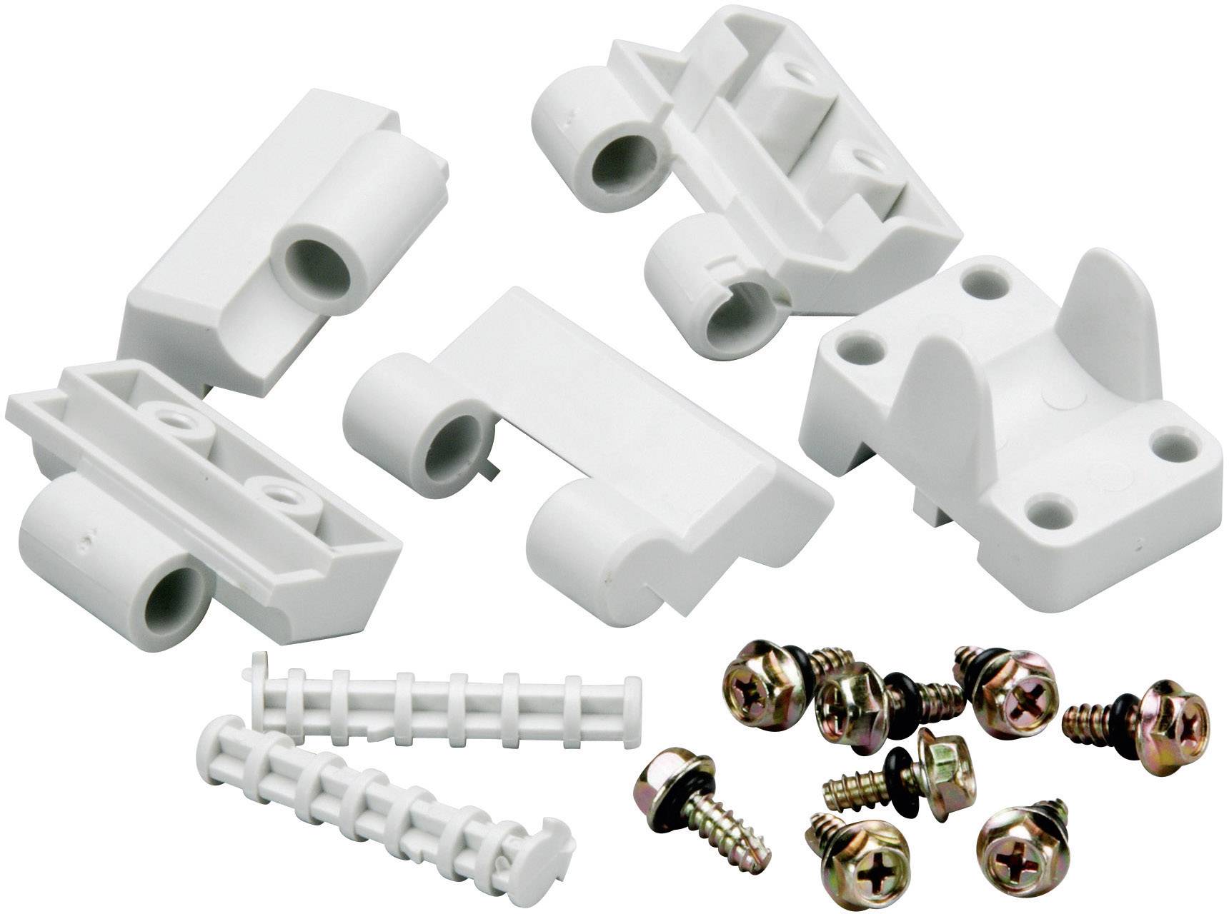 Weiße Kunststoff-Montagehalterungen und Schrauben. Geeignet für die Befestigung von Objekten an Wänden oder Möbeln.