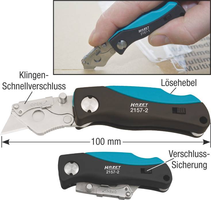 Ein Klappmesser mit Klingen-Schnellverschluss wird auf einem Karton verwendet. Details: Lösehebel, Verschluss-Sicherung, Länge 100 mm.