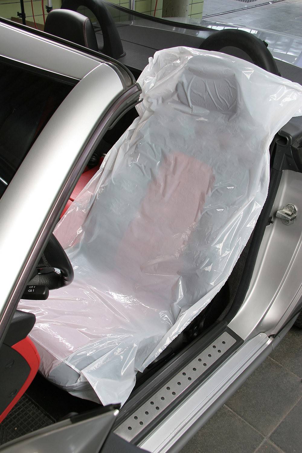 Sitzschoner - PKW Einweg-Sitzschoner Extra - 500 weiß ohne Aufdruck, perforiert, 820 x 1350 mm