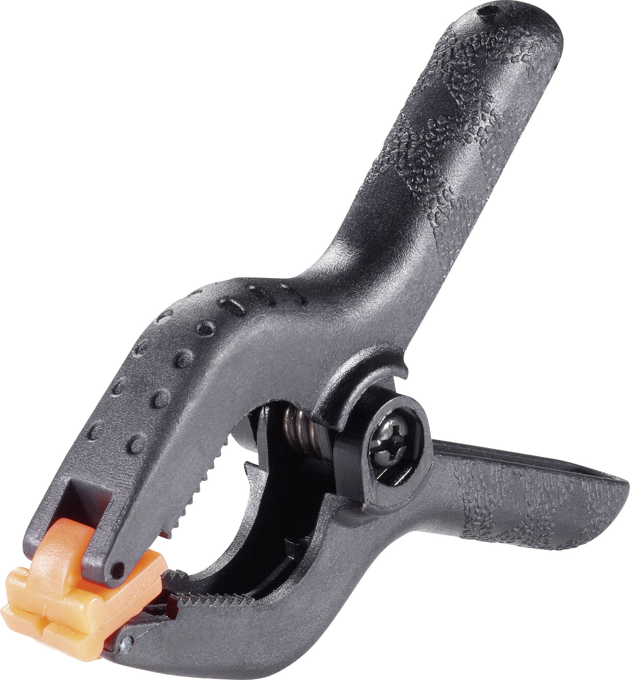 Eine schwarze Kunststoffklemme mit orangefarbenen Enden, bereit zum Festhalten oder Stabilisieren von Objekten.