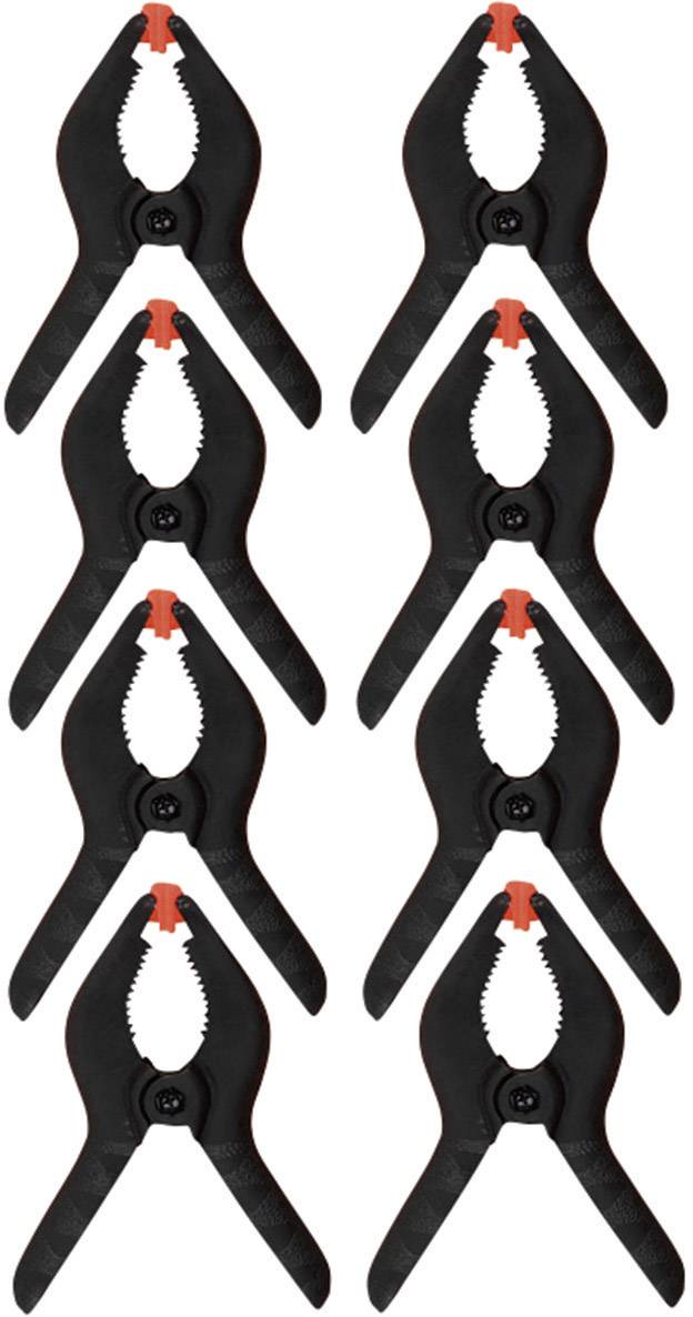 Acht schwarze Spannklemmen mit roten Spitzen, symmetrisch angeordnet in zwei Reihen zu je vier Klemmen, auf weißem Hintergrund.