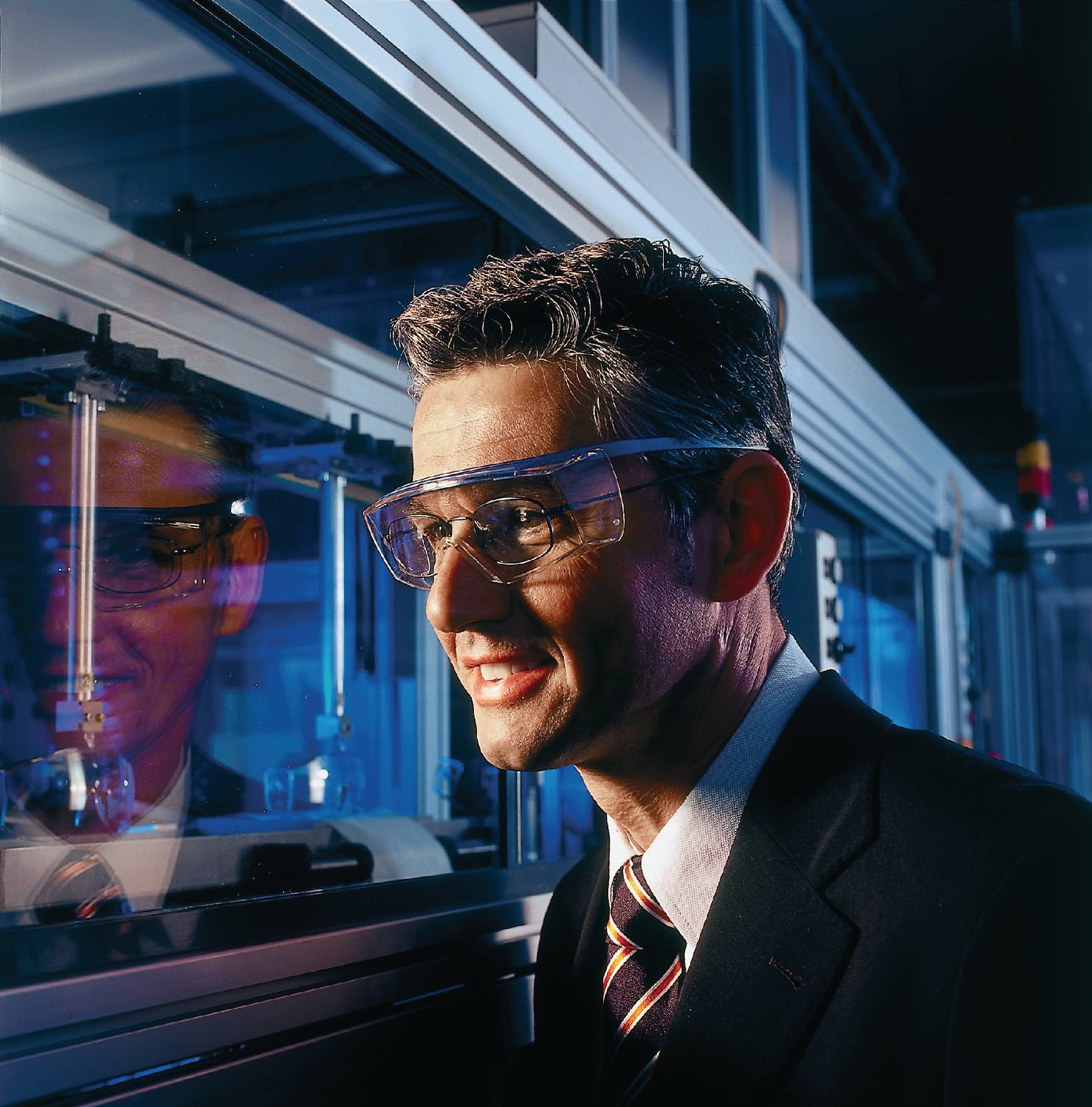 Uvex Ultrasonic Supravision Excellence Schutzbrille - Transparent/Rot-Schwarz