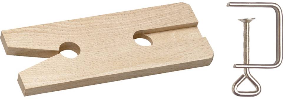 Holzschnittvorrichtung und Metallklemme.