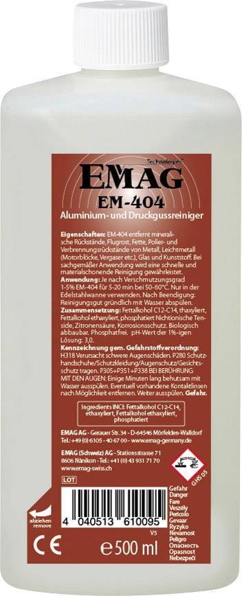 Eine Flasche EMAG EM-404 Aluminium- und Druckgussreiniger, 500 ml. Weiße Flasche mit rotem Etikett, Gebrauchsanweisung auf Deutsch.