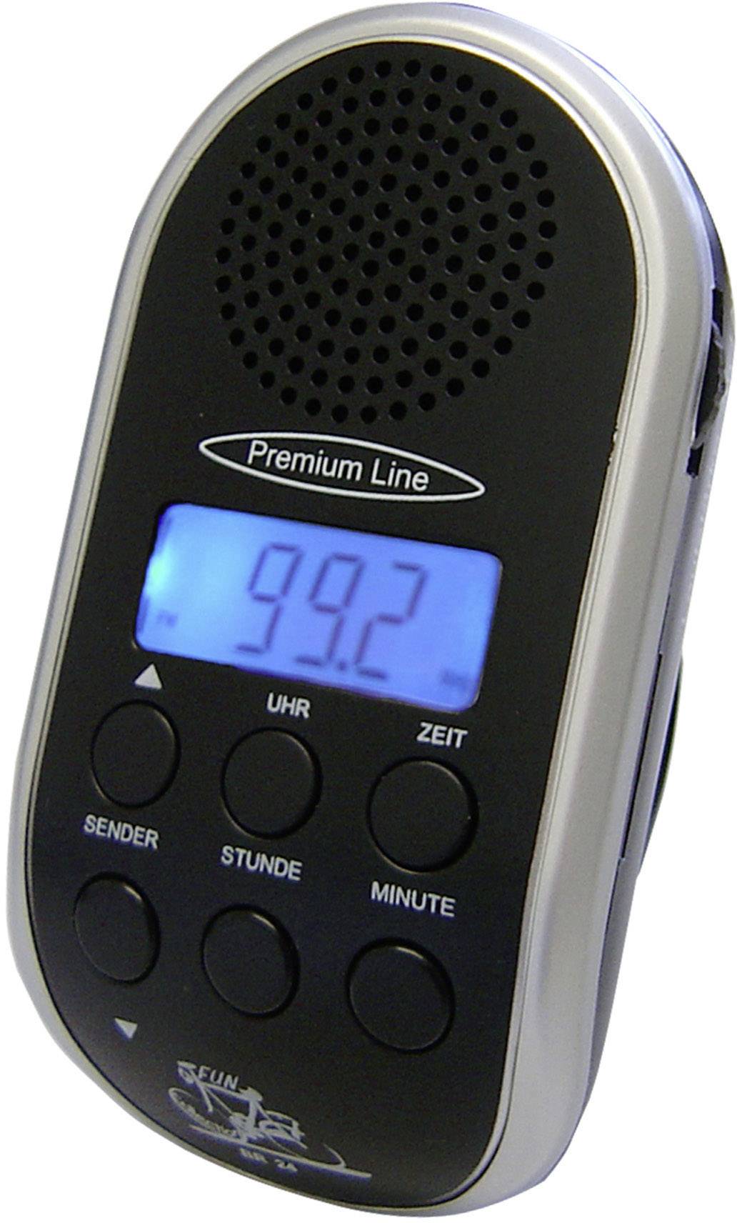 Ein tragbares Radio mit LCD-Anzeige zeigt die Frequenz '99.2'. Es hat Tasten für Sender, Uhrzeit sowie Stunde und Minute.