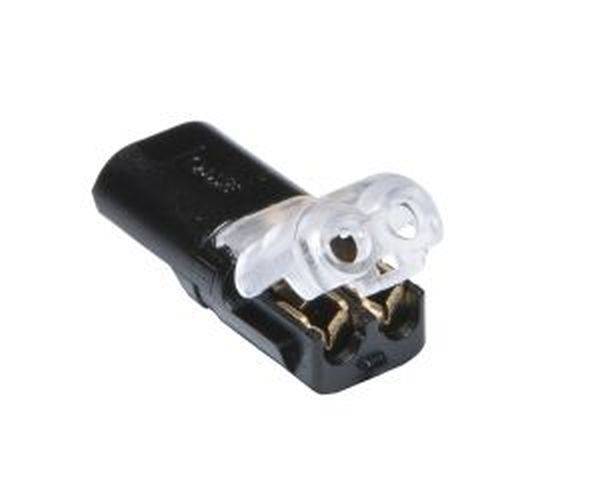 Ein schwarzer elektrischer Steckeradapter mit transparentem Kunststoffteil und zwei Metallkontakten.