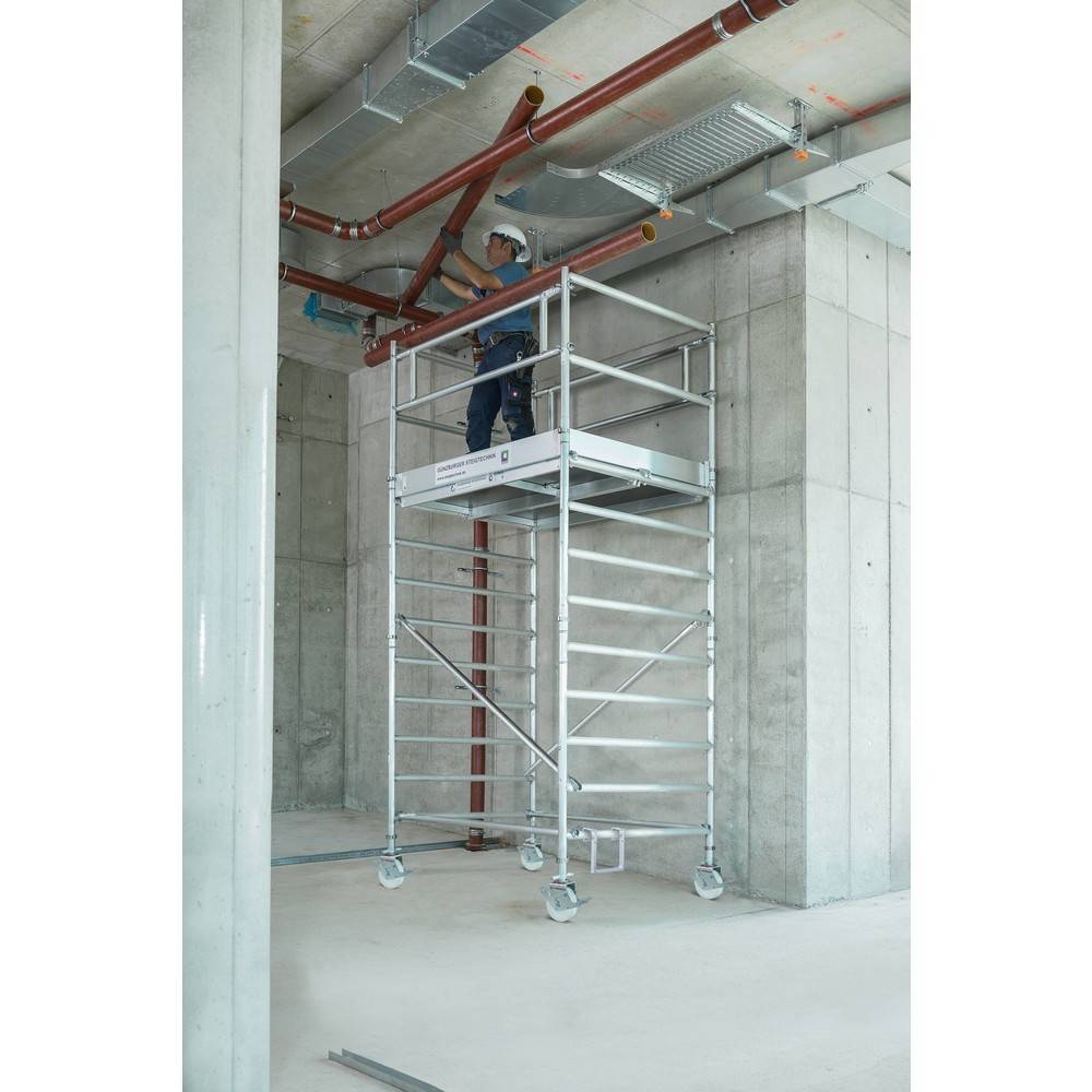 Munk Rollgerüst 1,35 x 1,80 m mit Fahrbalken & Doppel-Plattf 450346-YY