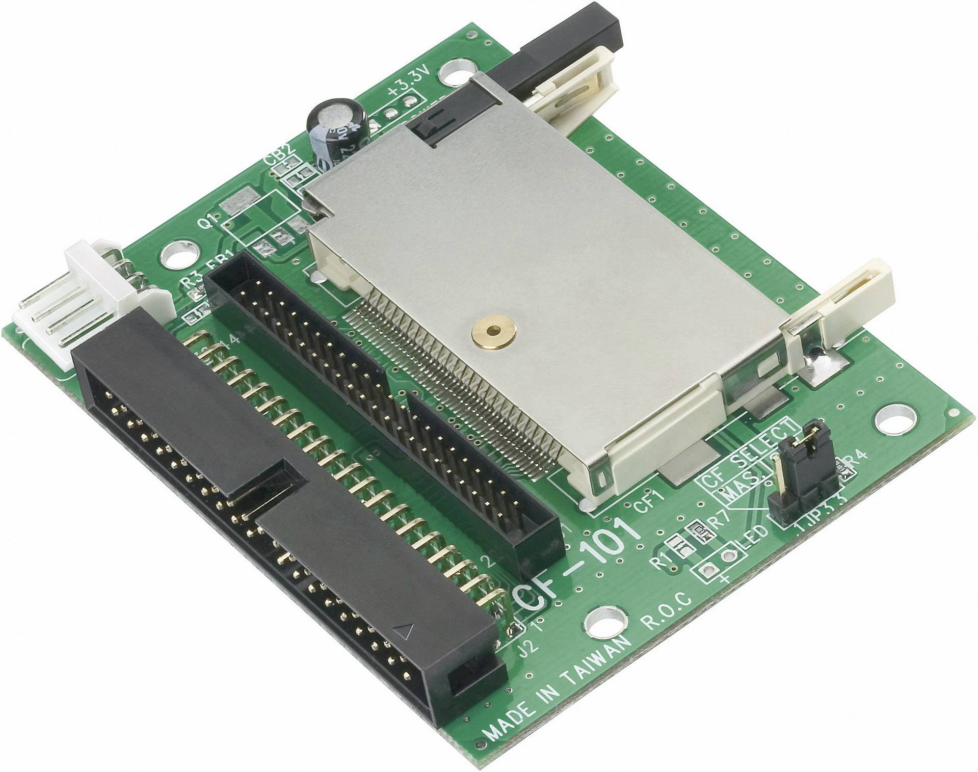 Eine grüne elektronische Schaltung mit mehreren Steckverbindungen und einem großen mittigen Metallchip, möglicherweise eine Adapterkarte.