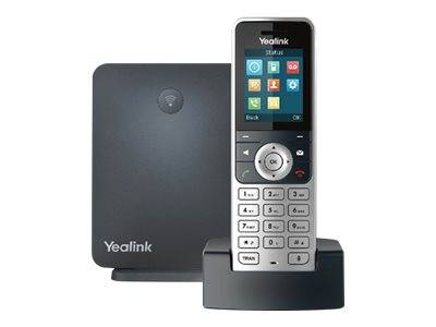 Yealink schnurloses Tischtelefon mit Hörer auf der Ladestation und großem schwarzen Basisgerät dahinter.