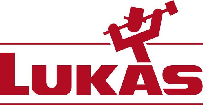 Eine rote Figur, die über einer roten horizontalen Linie springt, oberhalb der fettgedruckten roten Buchstaben 'UKA'.