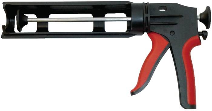 Eine Caulking-Pistole mit rotem Griff, schwarzem Rahmen und sichtbarer Metallstange, die zum Auftragen von Dichtungsmitteln oder Klebstoffen verwendet wird.
