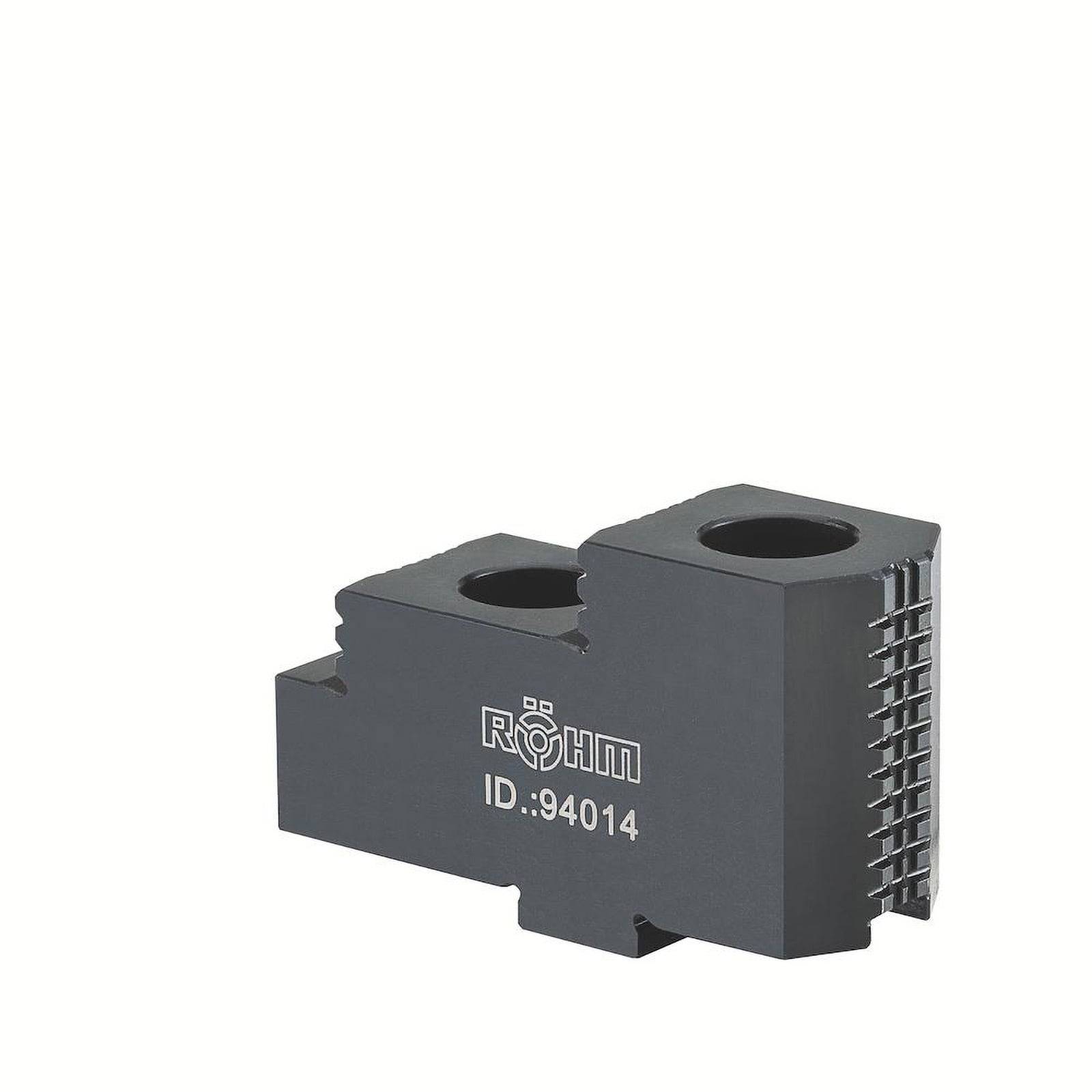 Ein graues Metallteil mit der Marke „RÖHM