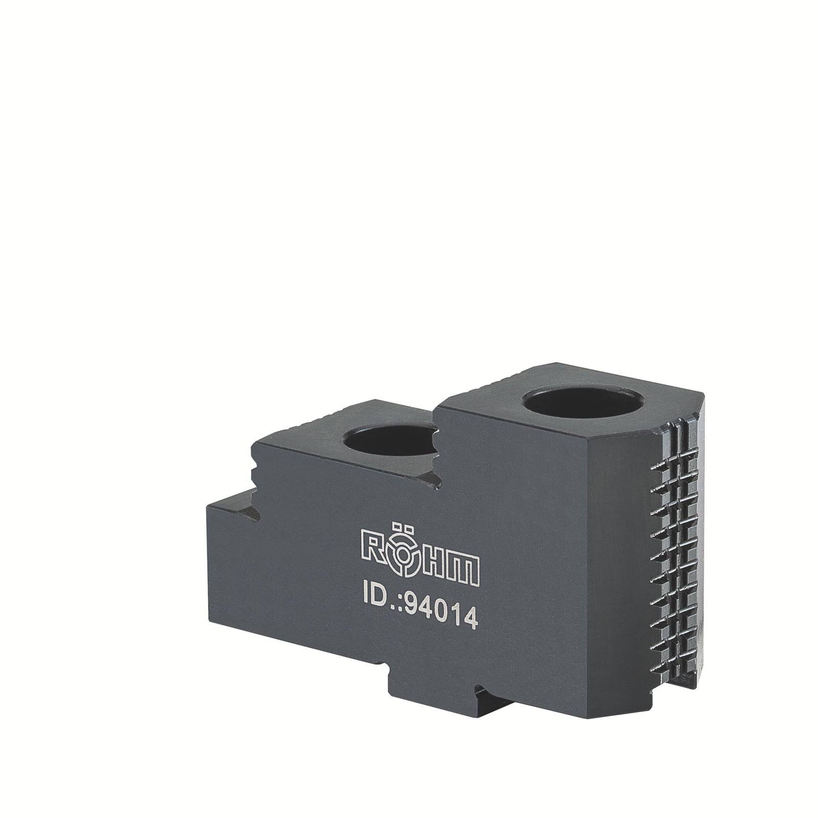 Eine Nahaufnahme eines grauen Metallblocks mit der Aufschrift „Röhm ID: 94014