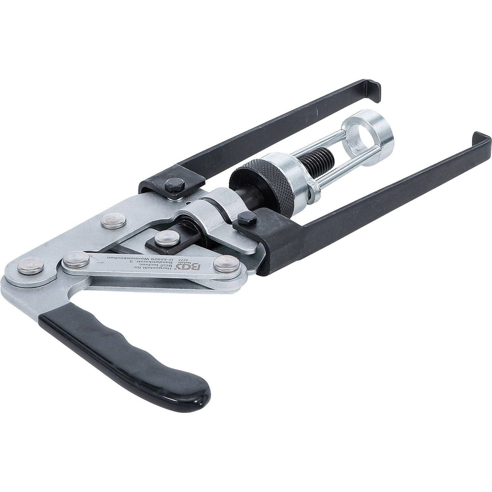 Ein silber- und schwarzer Multitool mit Hebeln und einem Ratschenmechanismus, der zum Greifen und Drehen konzipiert ist, vor einem weißen Hintergrund.