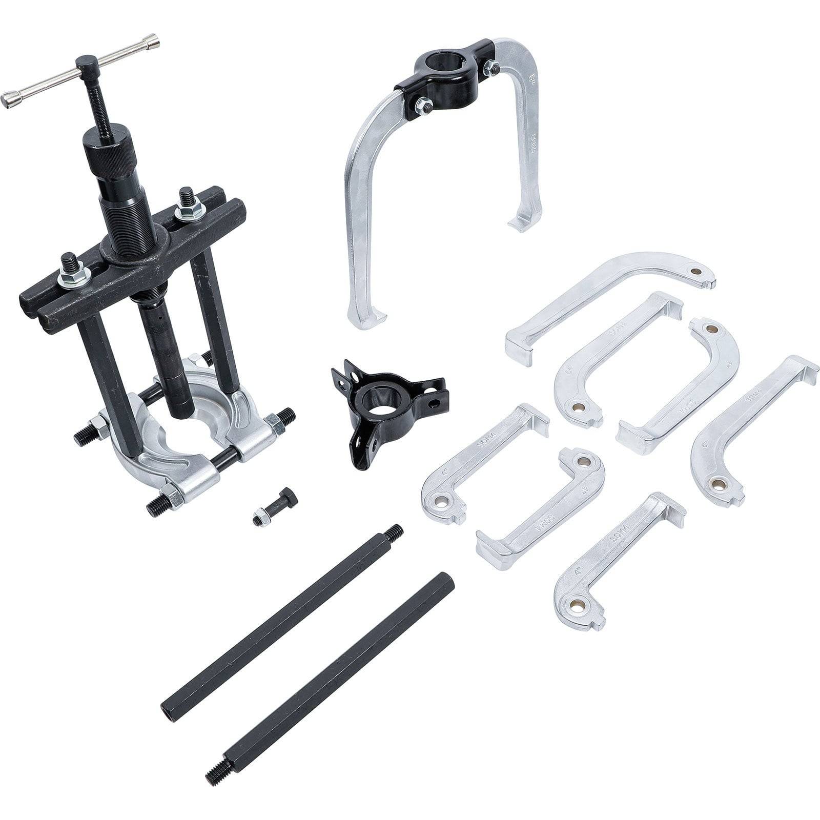 Ein Satz Automobilwerkzeuge, bestehend aus einem Zahnradabzieher, Halterungen und Stangen, auf einem weißen Hintergrund angeordnet, der für mechanische Reparaturen verwendet wird.