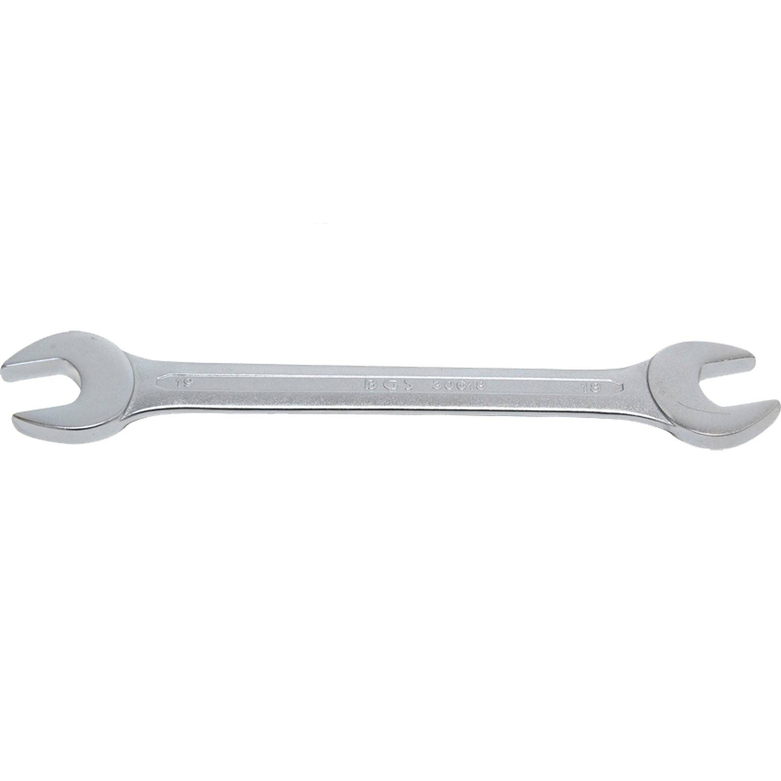 Ein Schraubenschlüssel aus Metall mit zwei unterschiedlich großen Enden, der zum Greifen und Drehen von Schrauben oder Muttern verwendet wird.