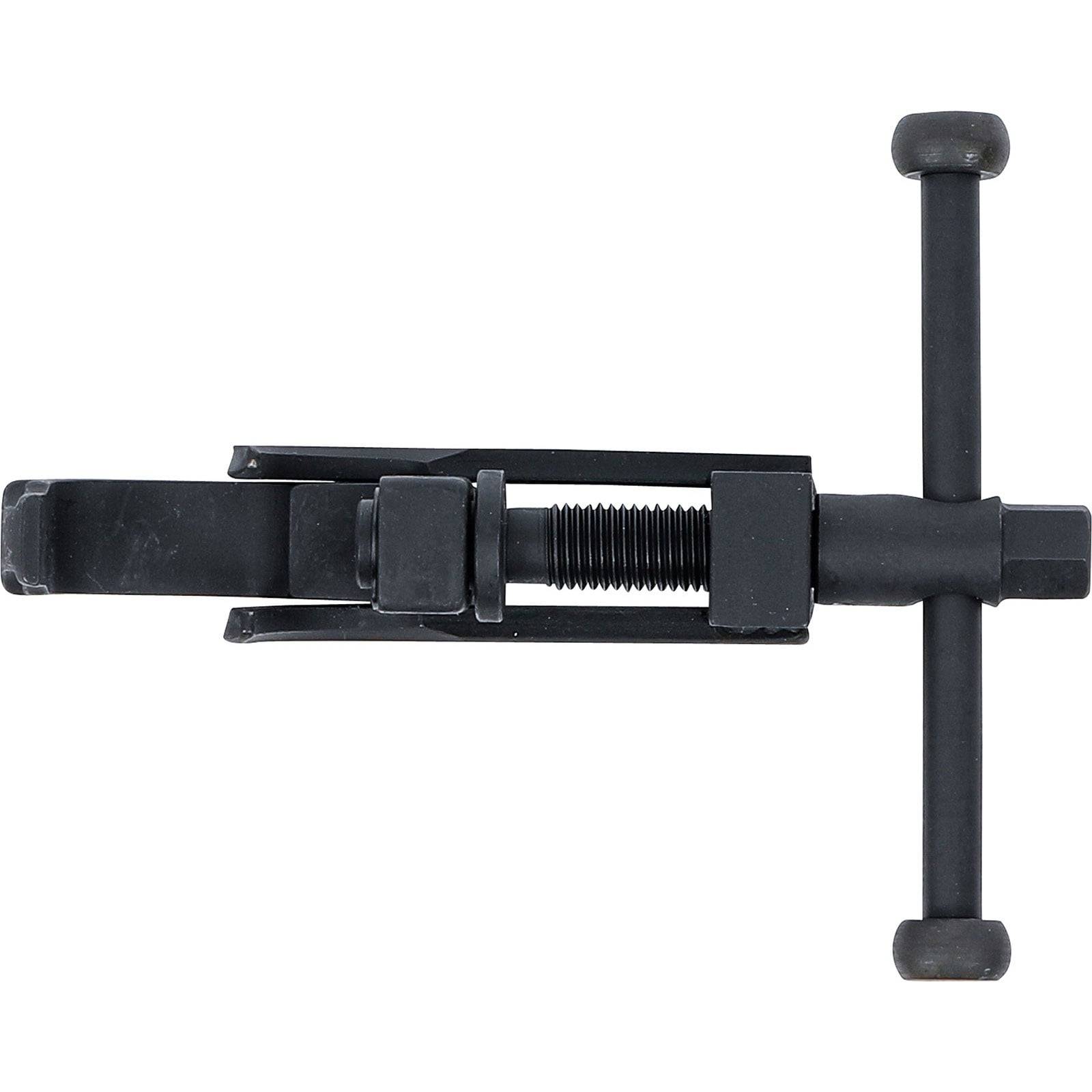 Ein schwarzer Kettentrennwerkzeug mit einem Griff, das zum Entfernen oder Installieren von Ketten durch Herausdrücken oder Einsetzen von Kettenstiften verwendet wird.