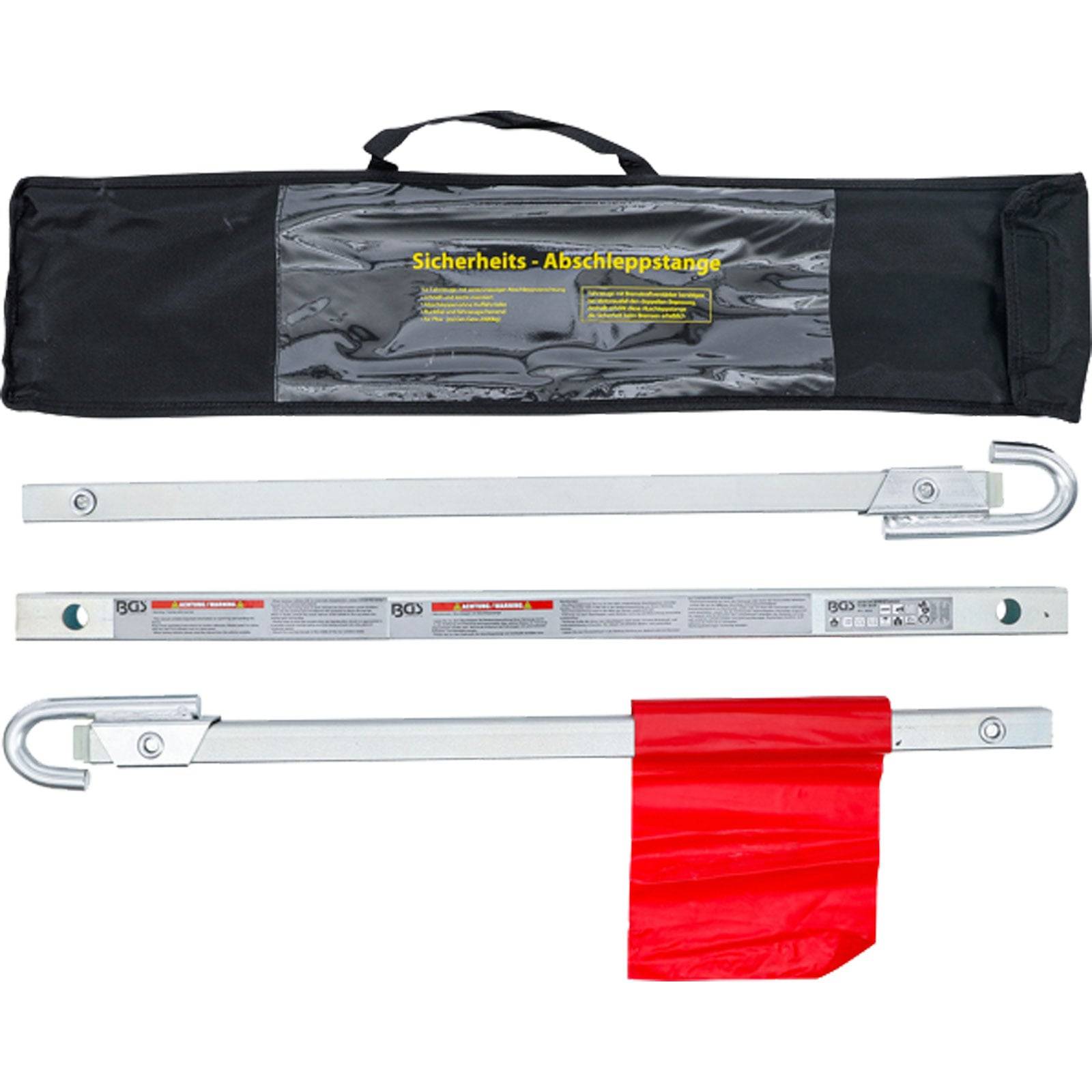 Abschleppstange mit zwei Metallstangen, Haken an den Enden, einer roten Flagge und einem schwarzen Transportkoffer mit der Aufschrift 