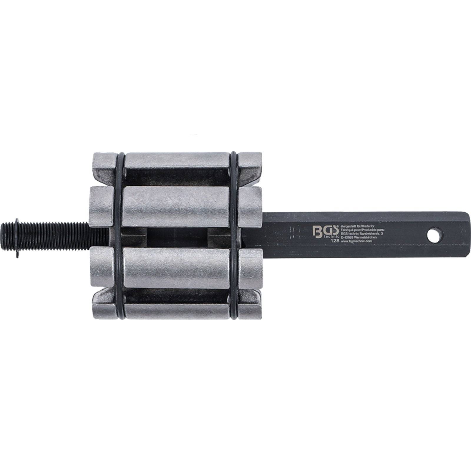 Ein Kettentrenner, ein Metallwerkzeug mit Griff und verstellbarer Schraube, der zum Trennen von Ketten bei mechanischen Arbeiten oder Reparaturen verwendet wird.