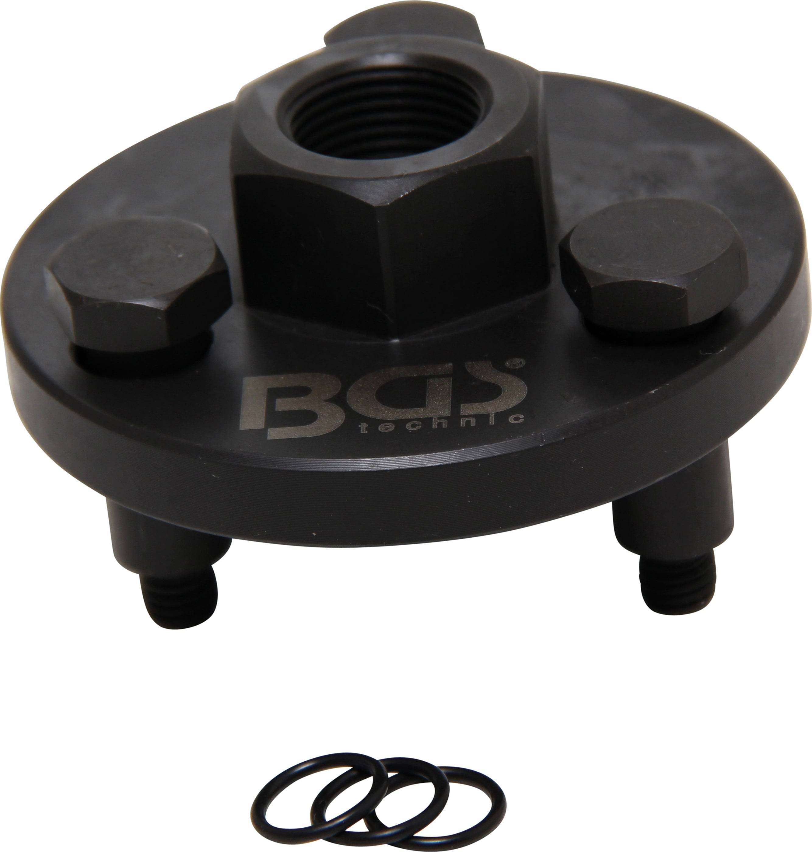 Ölfilterschlüssel mit 'BGS technic' Logo, sechseckige Schraube, drei verstellbare Beine und Gummiringe unten. Verwendet für die Automobilwartung.