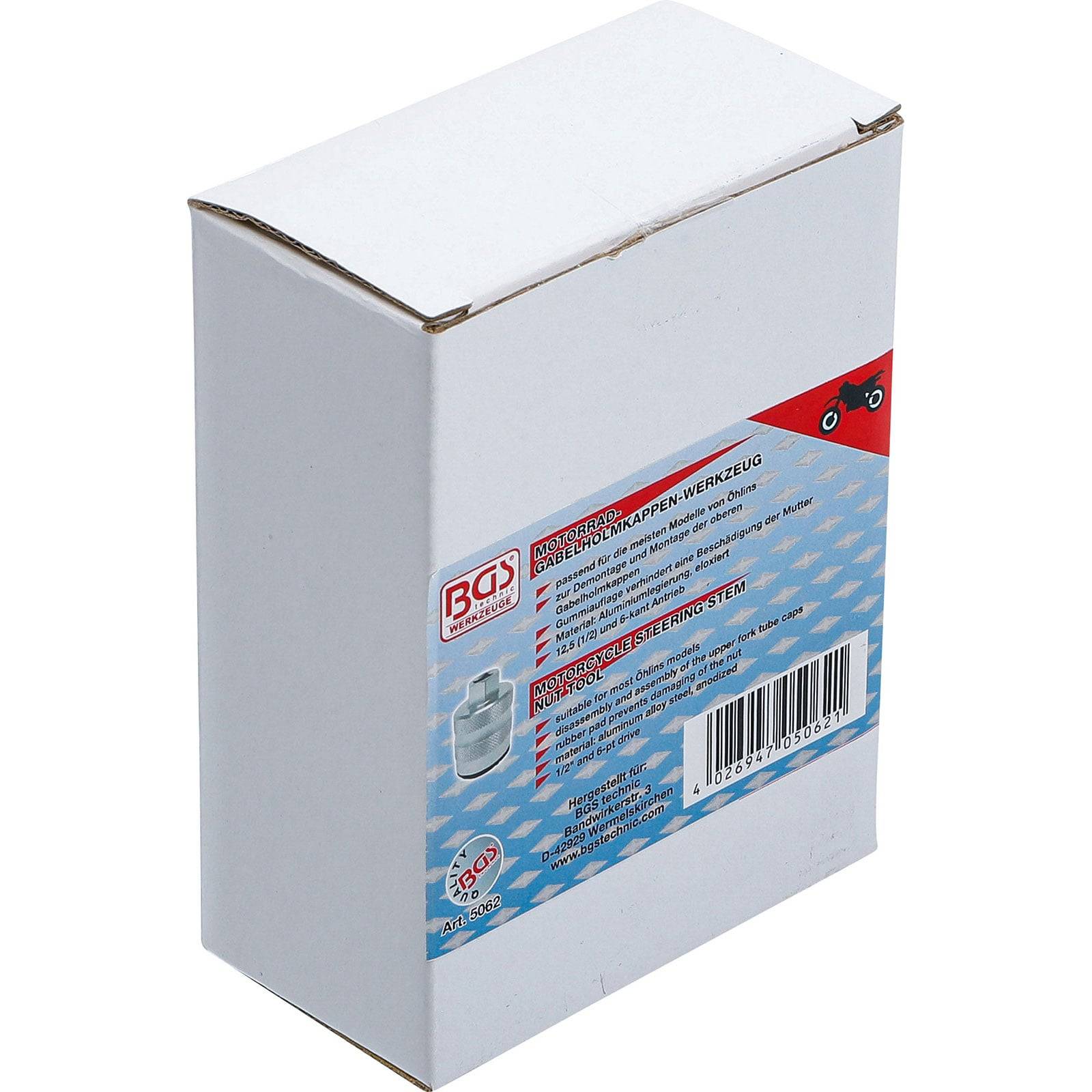 Das Bild zeigt eine weiße rechteckige Box mit einem roten und blauen Etikett, das eine Liste von Produktdetails und ein Bild des Werkzeugs im Inneren enthält.