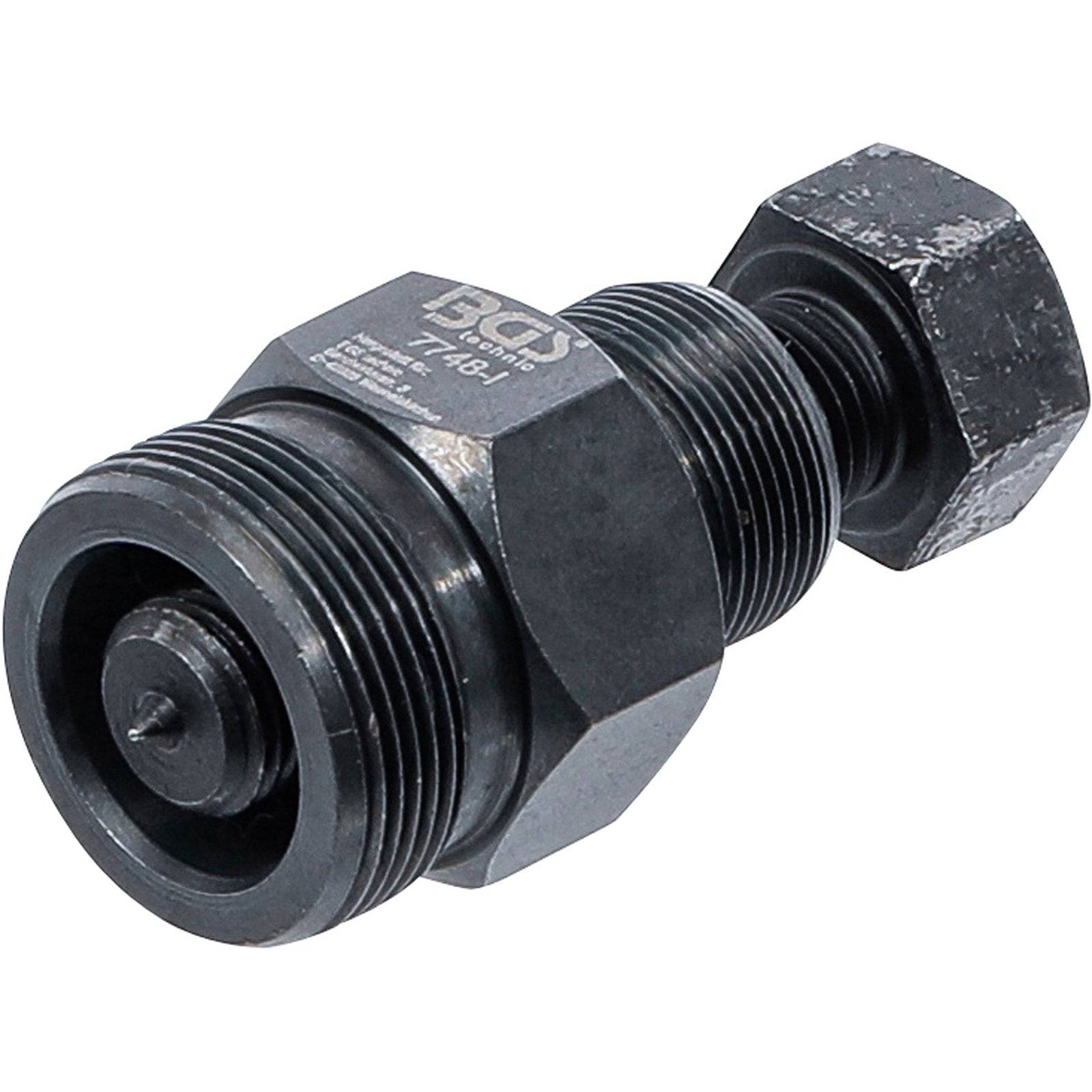 Ein Nahaufnahmebild eines Metallwerkzeugs mit Gewindeteilen, das für mechanische Zwecke verwendet wird. Es erscheint schwarz und metallisch mit mehreren Abschnitten.