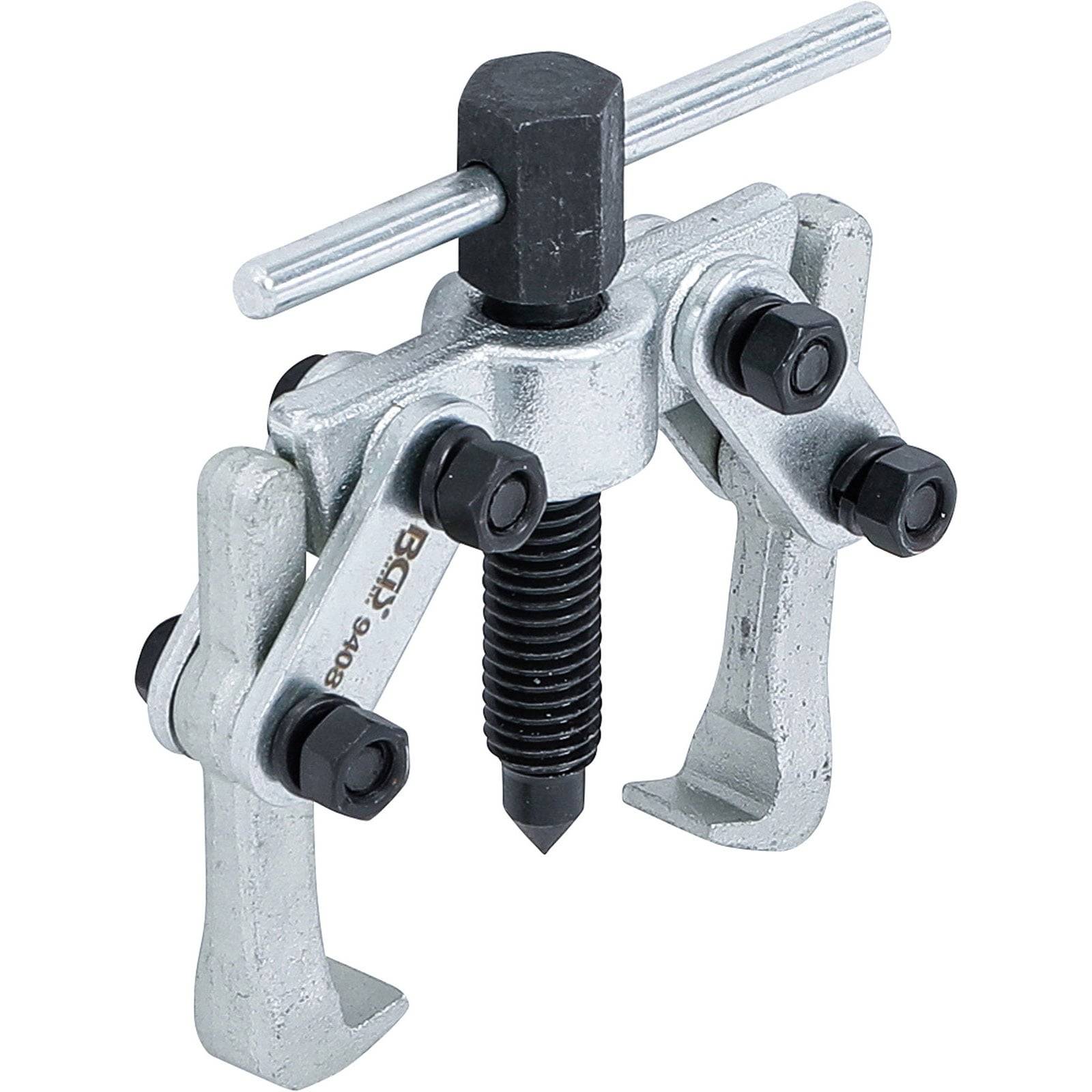 Ein Metallgeräteabzieher mit verstellbaren Armen und einer zentralen Schraube, der zum Entfernen von Zahnrädern oder Riemenscheiben von Wellen in mechanischen Umgebungen verwendet wird.
