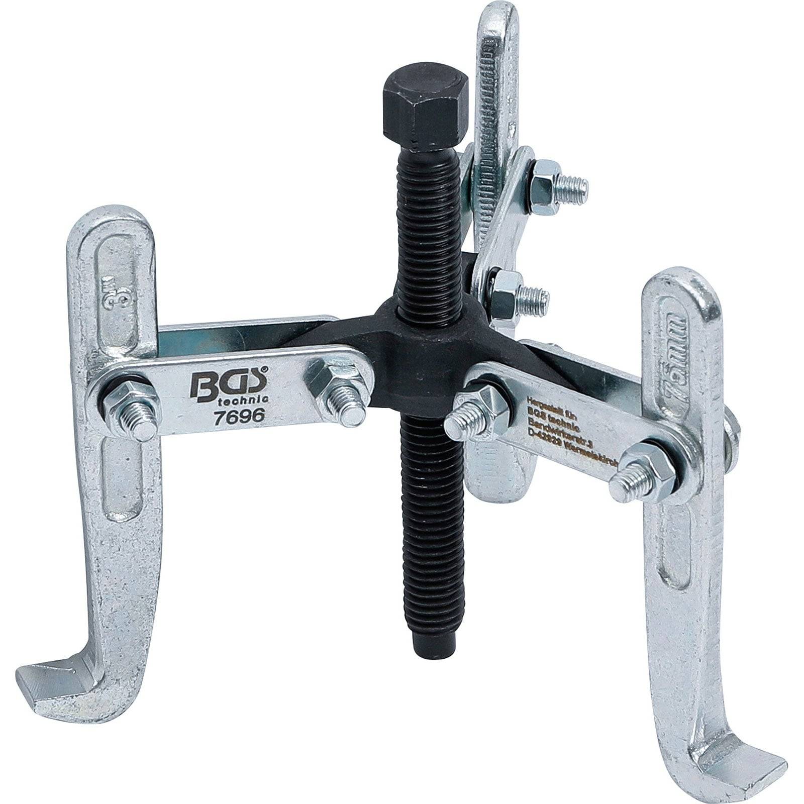 Ein Drei-Backen-Auszieher mit einer zentralen Schraube, verwendet zum Abziehen von Zahnrädern oder Riemenscheiben. Aus Metall gefertigt mit Herstellertext auf den Armen.