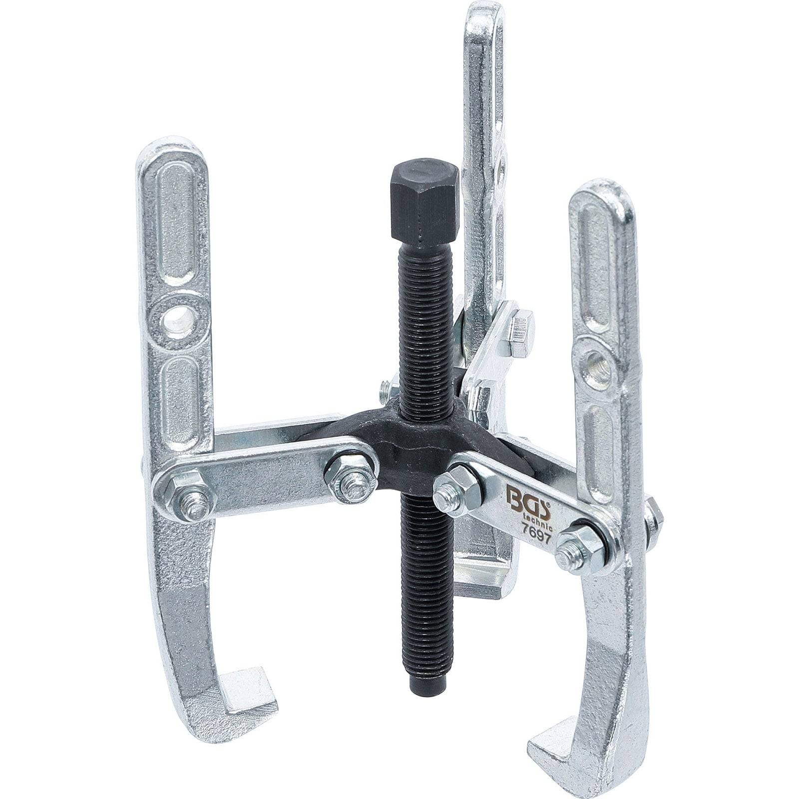 Ein Abzieher aus Metall mit drei Greifbacken und einer zentralen Schraube, der zum Abziehen von Zahnrädern, Riemenscheiben oder Lagern von rotierenden Wellen verwendet wird.