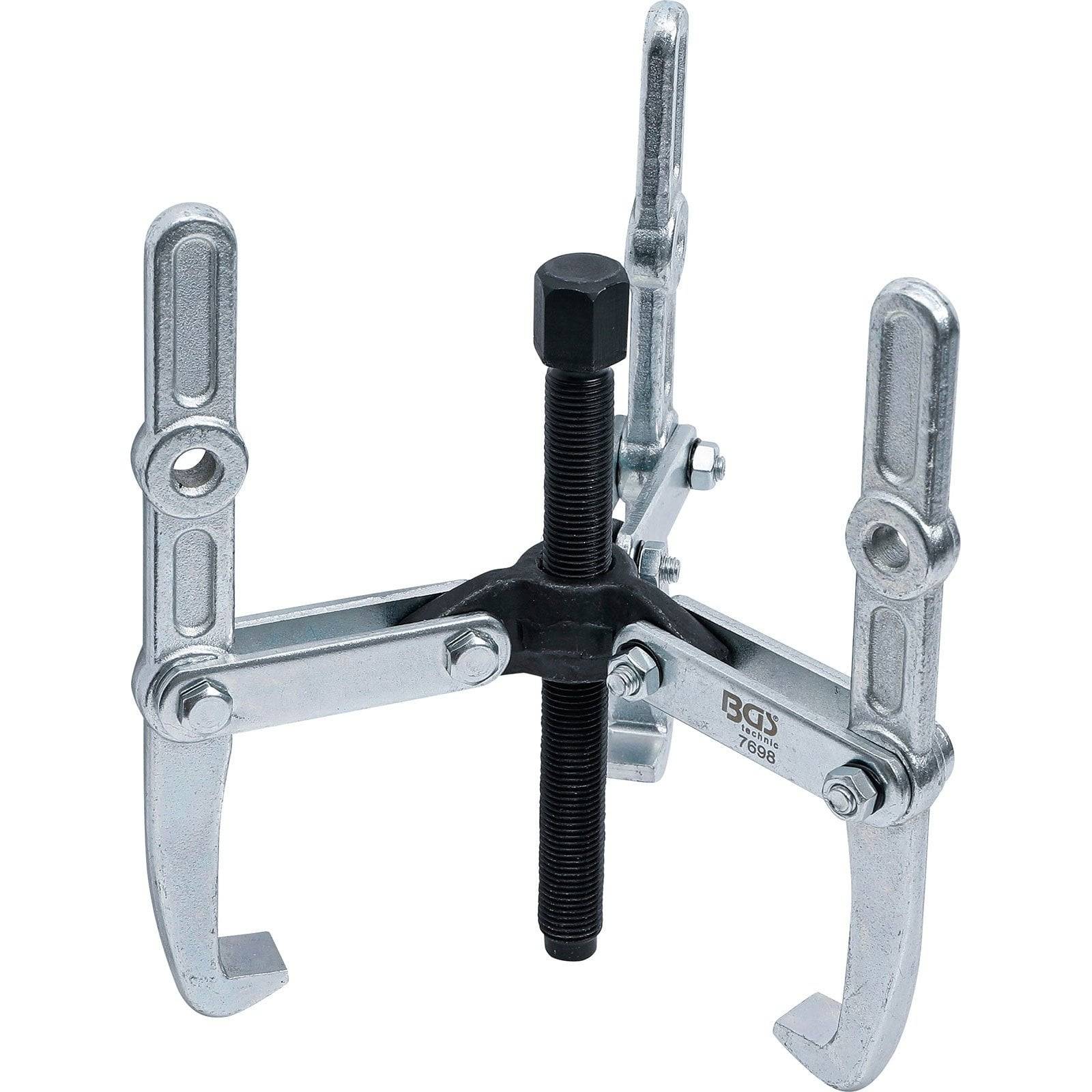 Ein Dreiklauen-Abzieher, bestehend aus Metallarmen und einem zentralen Bolzen, zum Entfernen von Zahnrädern, Riemenscheiben oder Lagern in mechanischen Anwendungen.