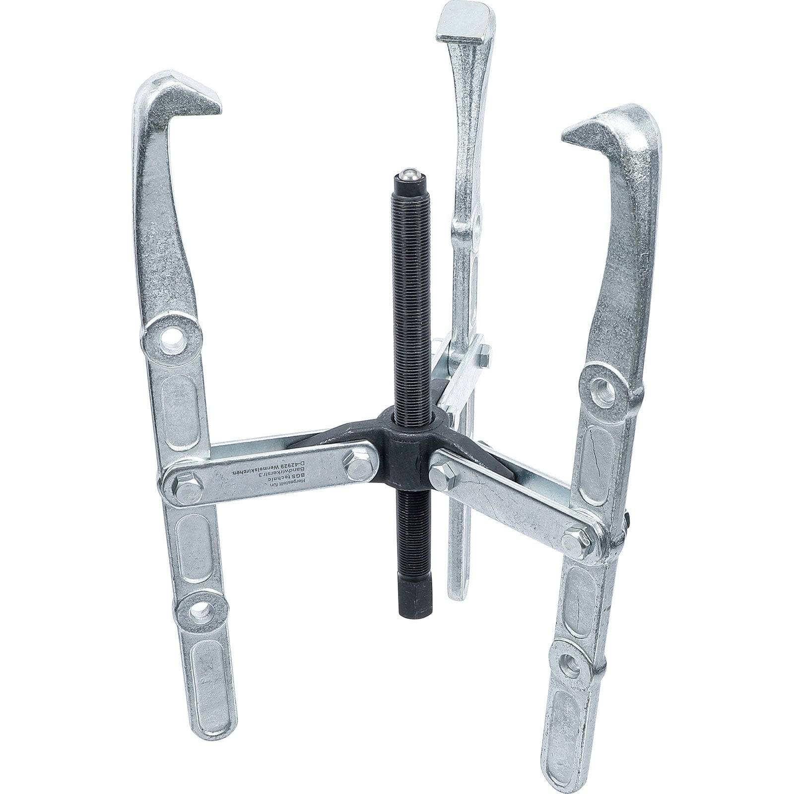 Ein Drei-Backen-Abzieher mit verstellbaren Armen und einer zentralen Schraube, der zum Entfernen von Zahnrädern oder Lagern in mechanischen Anwendungen entwickelt wurde.