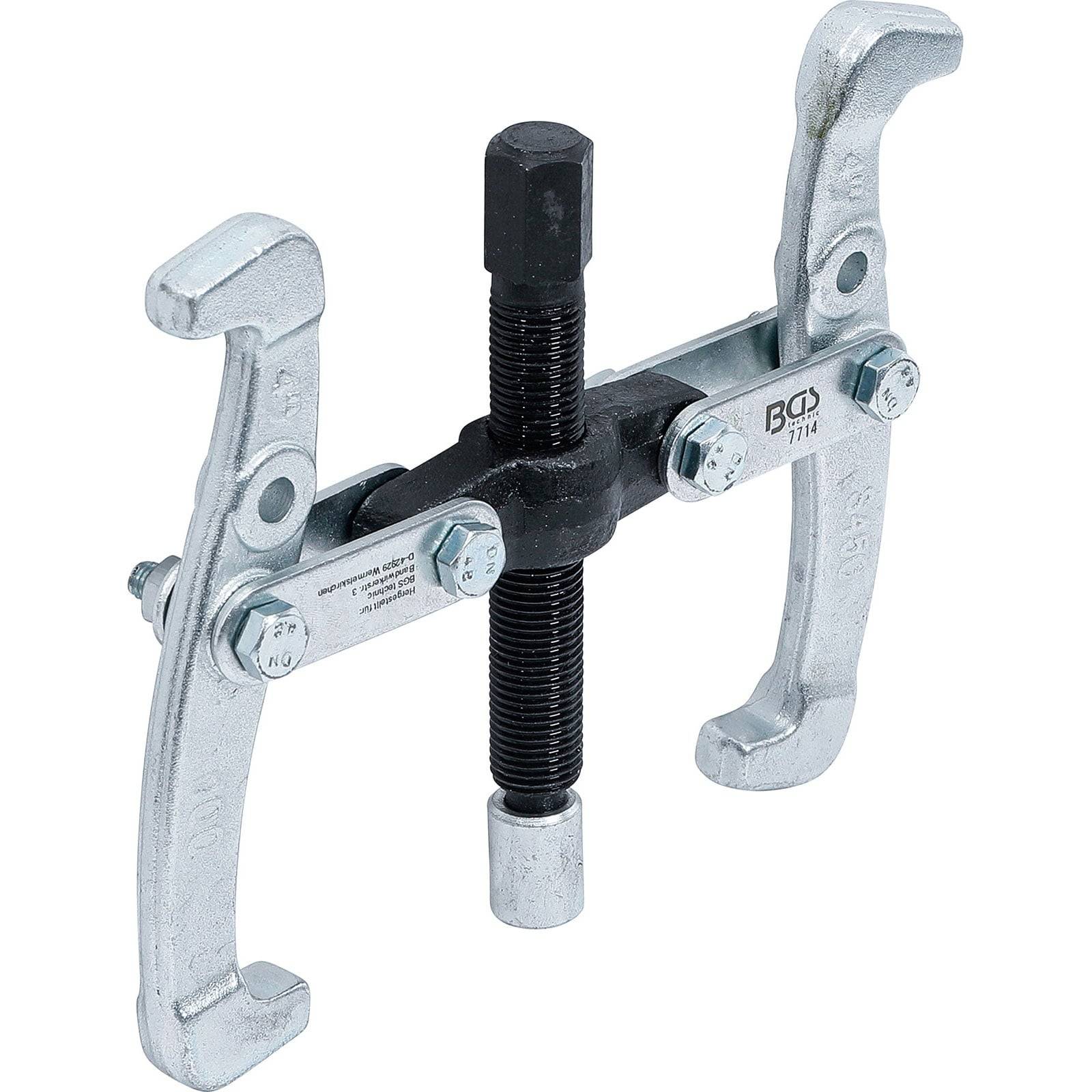 Zwei-Arm-Zahnradabzieher mit silbernen Armen und schwarzer Zentralschraube, verwendet zum Entfernen von Zahnrädern oder Lagern bei der Maschinenwartung.