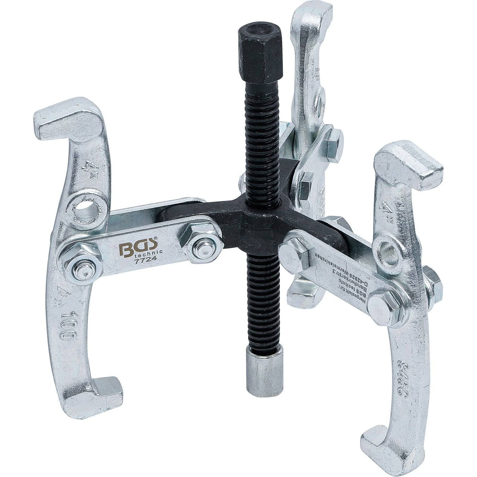 Ein Dreiklauen-Abzieher mit verstellbaren Armen und einer zentralen Gewindebolzen, der zum Abnehmen von Zahnrädern oder Riemenscheiben von Wellen verwendet wird.