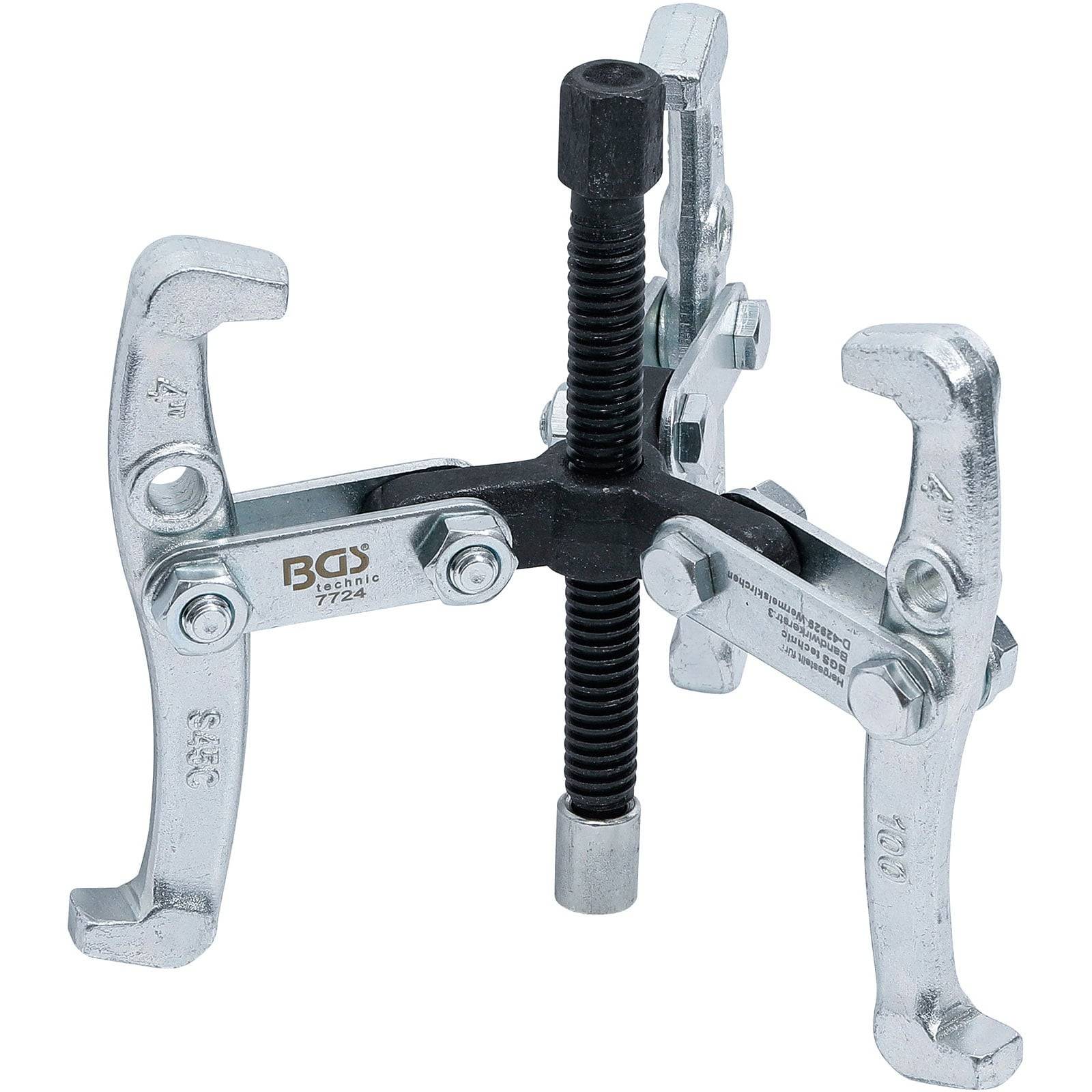 Ein dreizinkiger Abzieher mit verstellbaren Backen und einer zentralen Schraube, der zum Entfernen von Zahnrädern oder Lagern aus Maschinen verwendet wird.